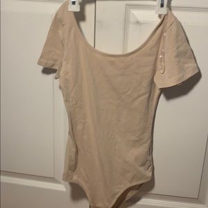 tan body suit